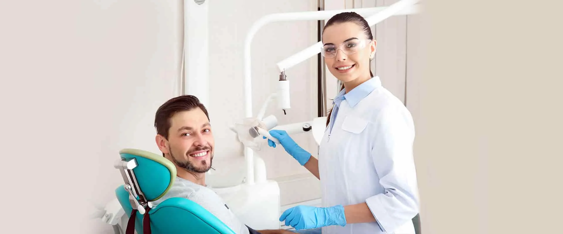 Mississauga dentist with patient at Pearl Dental Care.