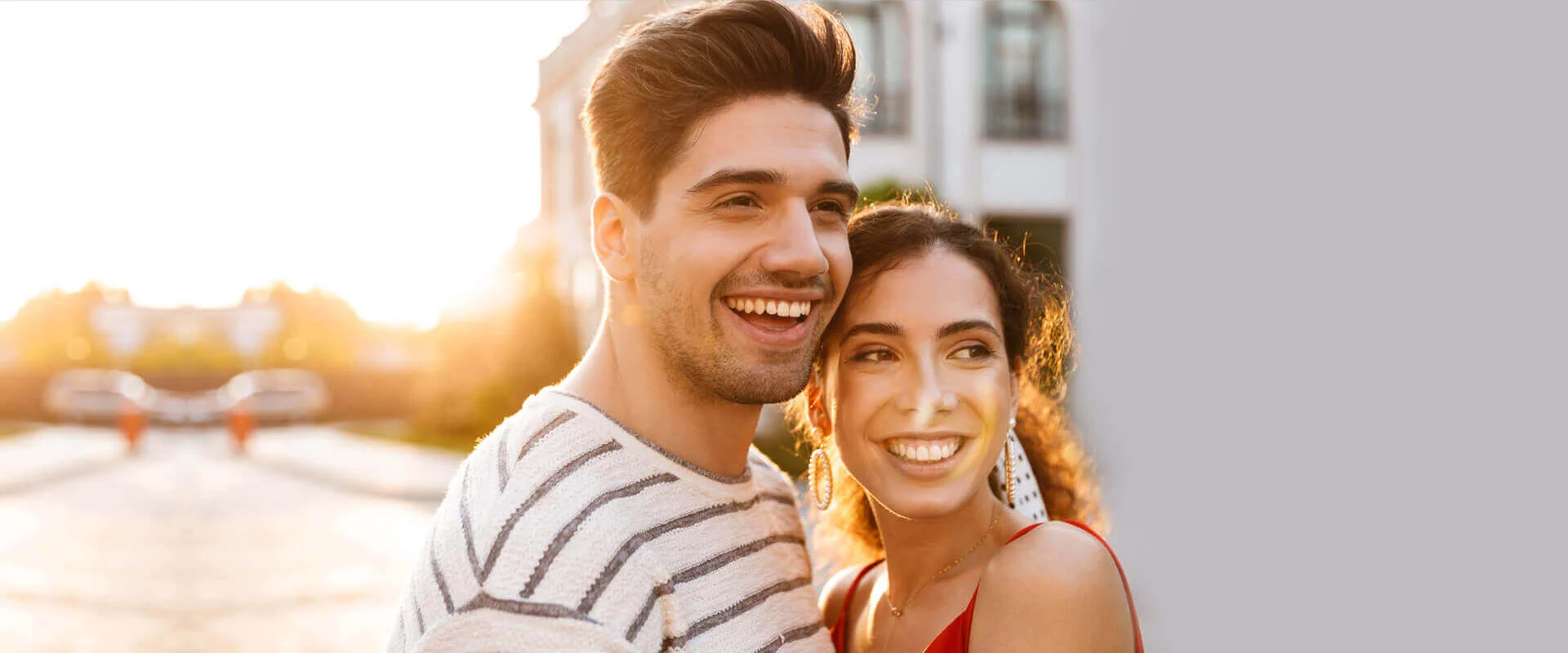 Smiling couple with healthy oral smilles.